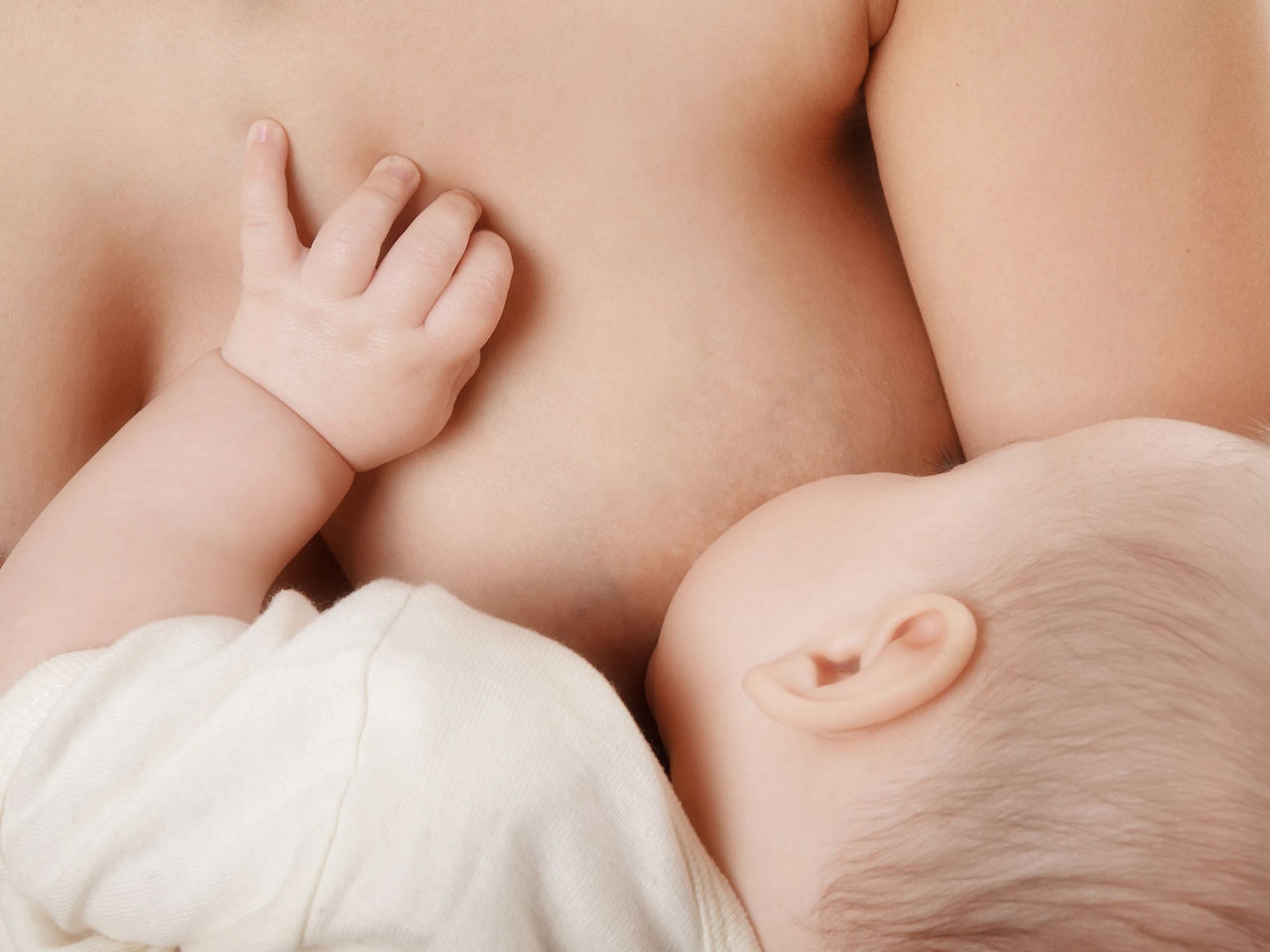 Breastfeeding on sofa