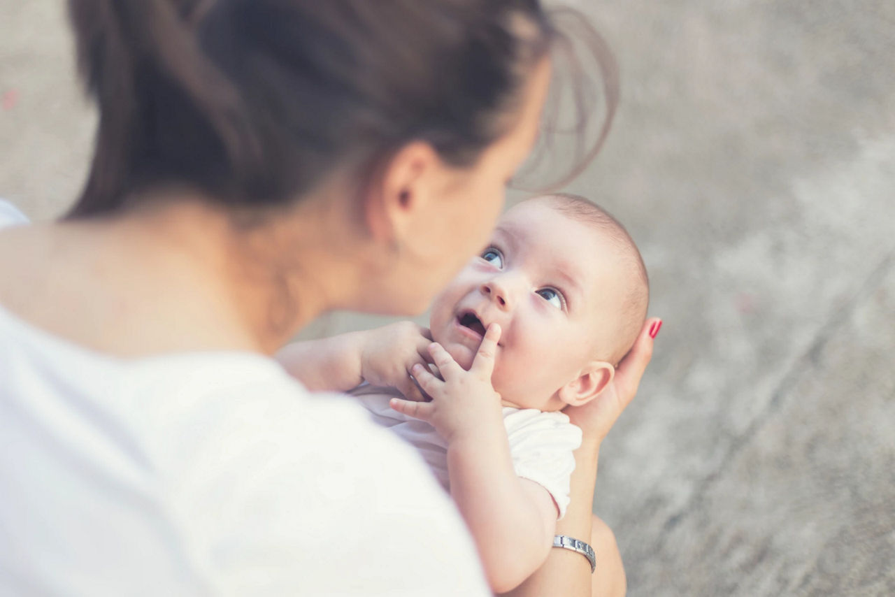 Mum holding baby