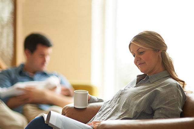 mum relaxing with magazine