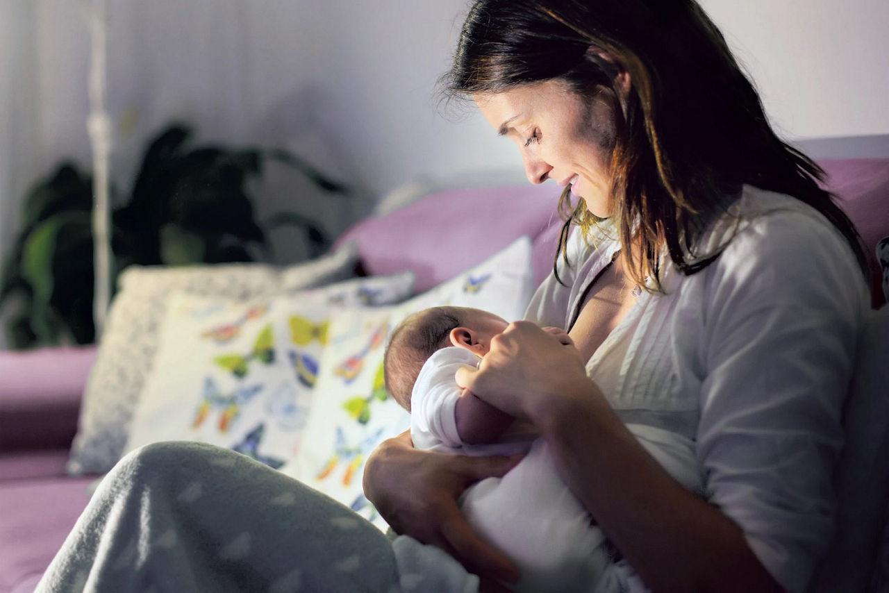 Breastfeeding on sofa