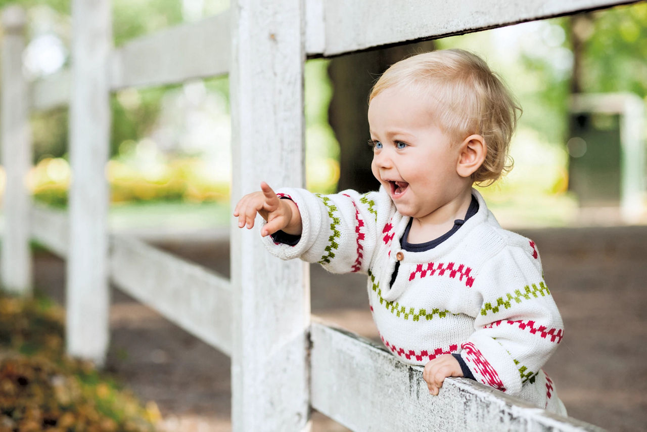 Baby at fence