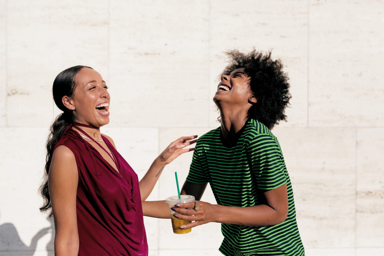 two girls laughing