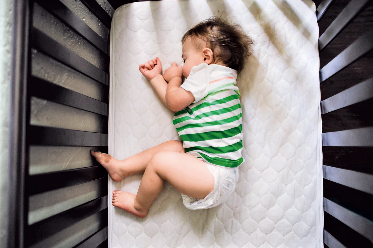 sleeping baby in crib