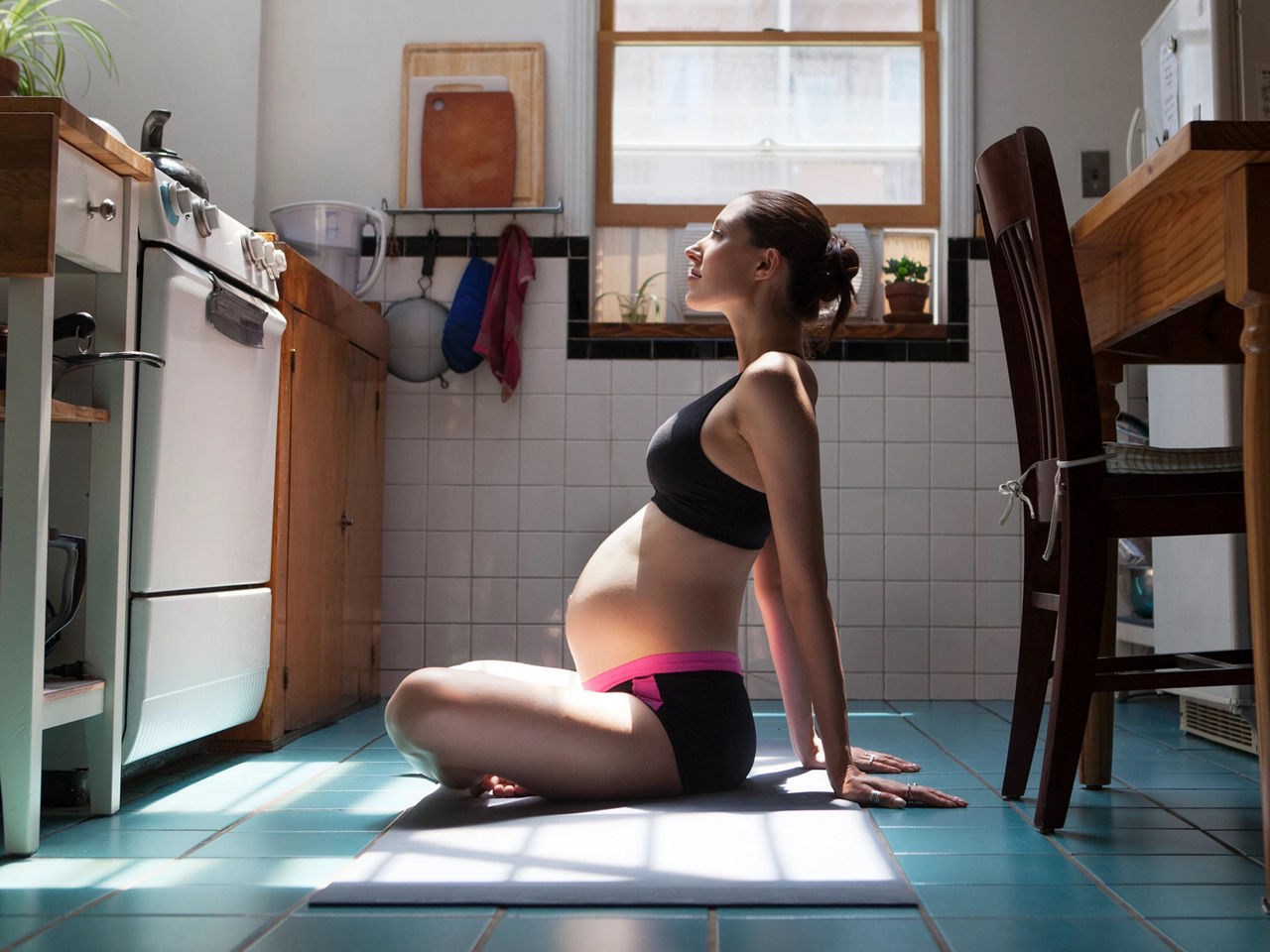 Expectent mother doing pelvic floor exercises