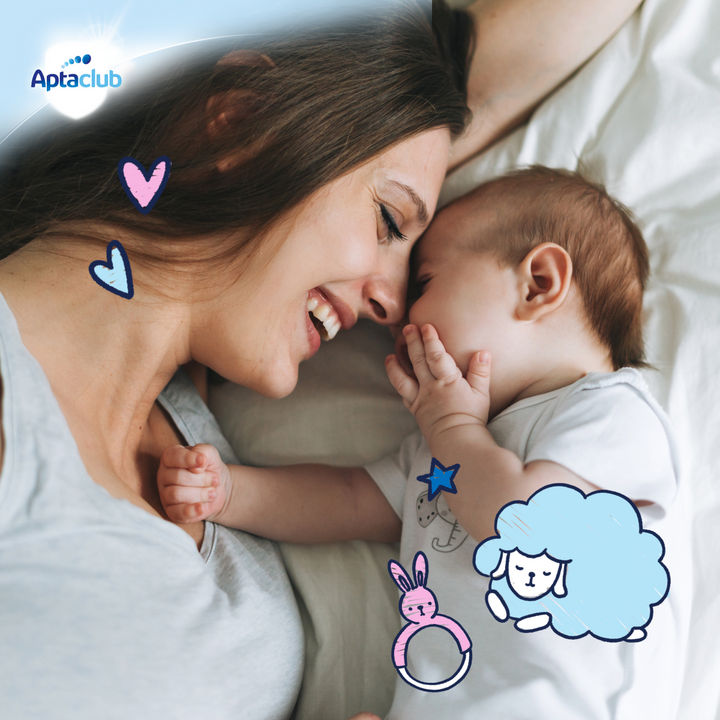 mother and baby laughing
