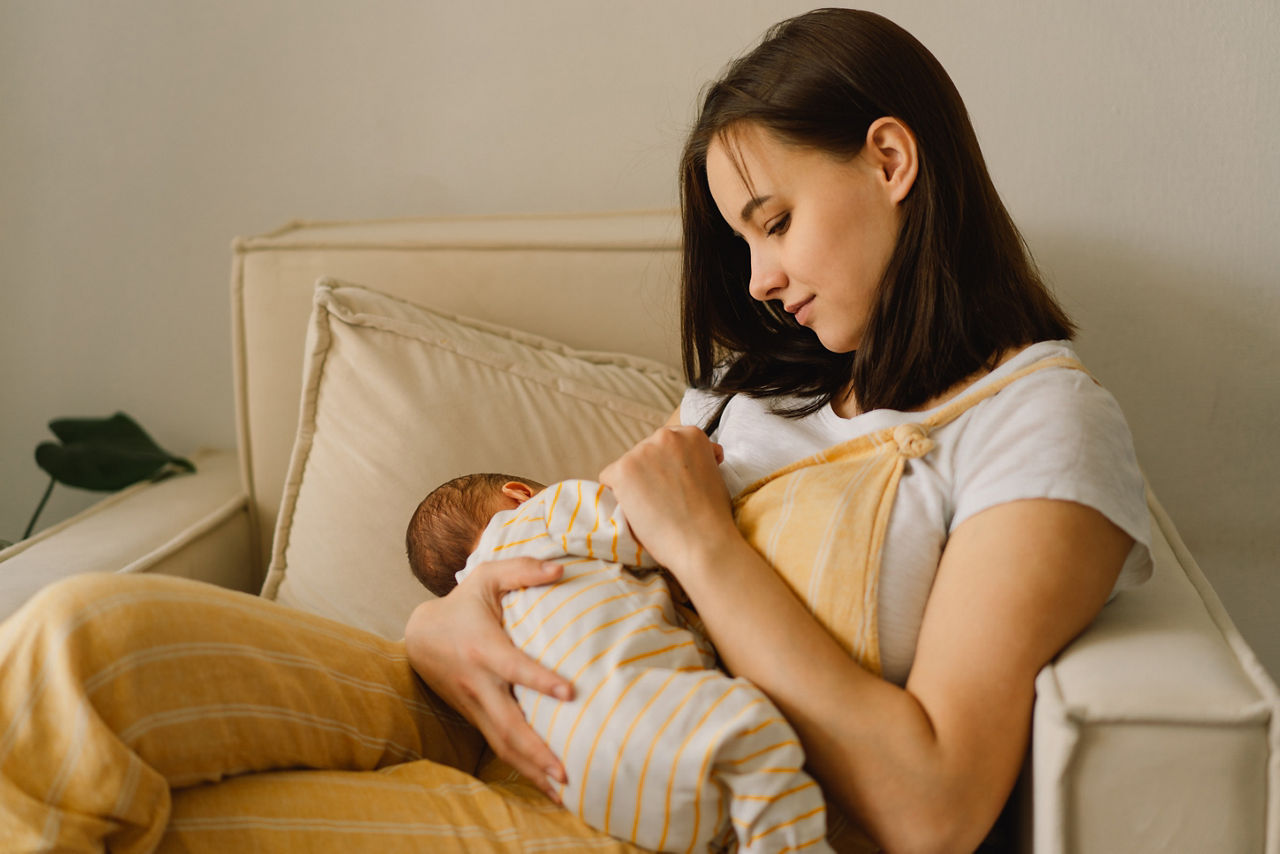 Mother breastfeeding baby