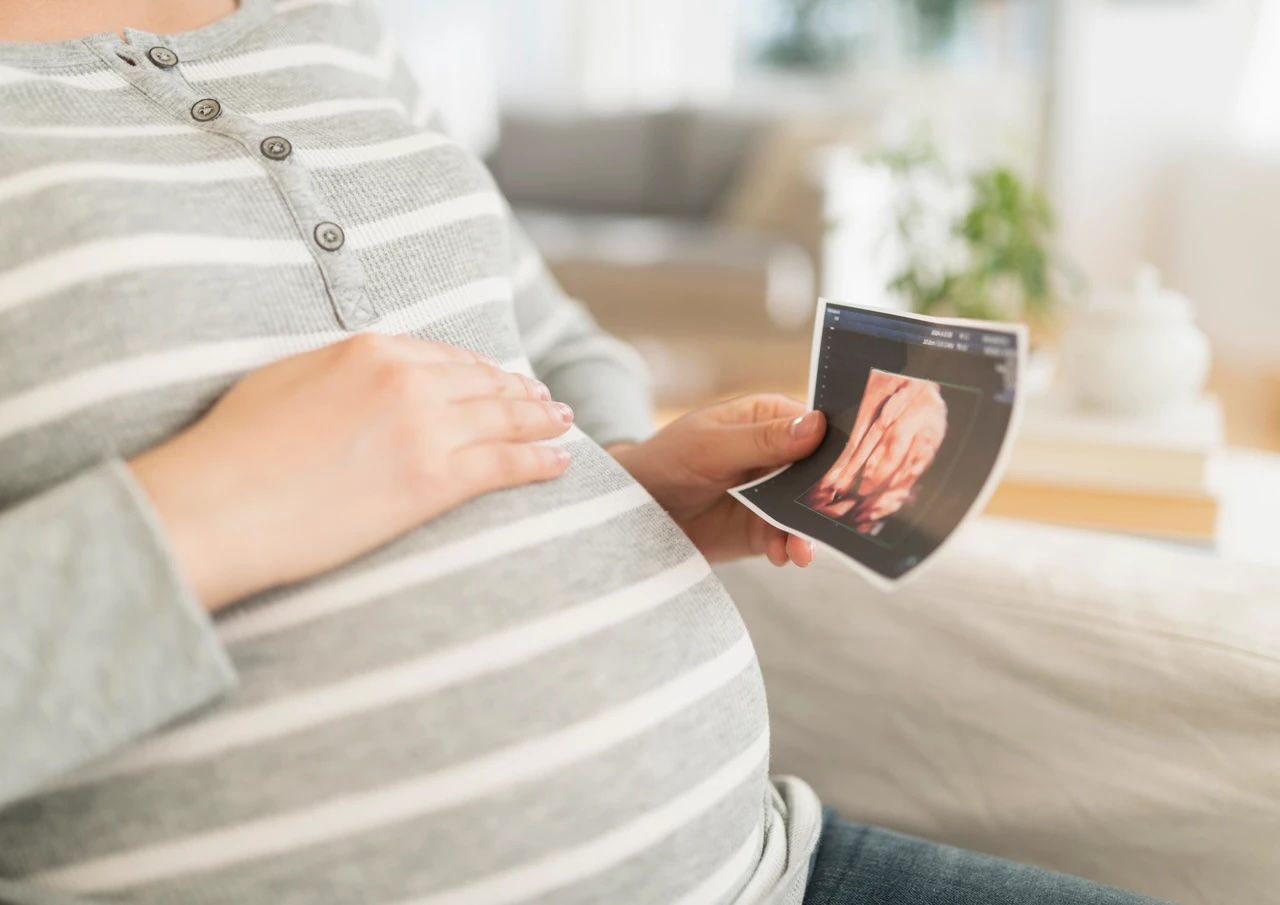 Pregnant woman lying on her side