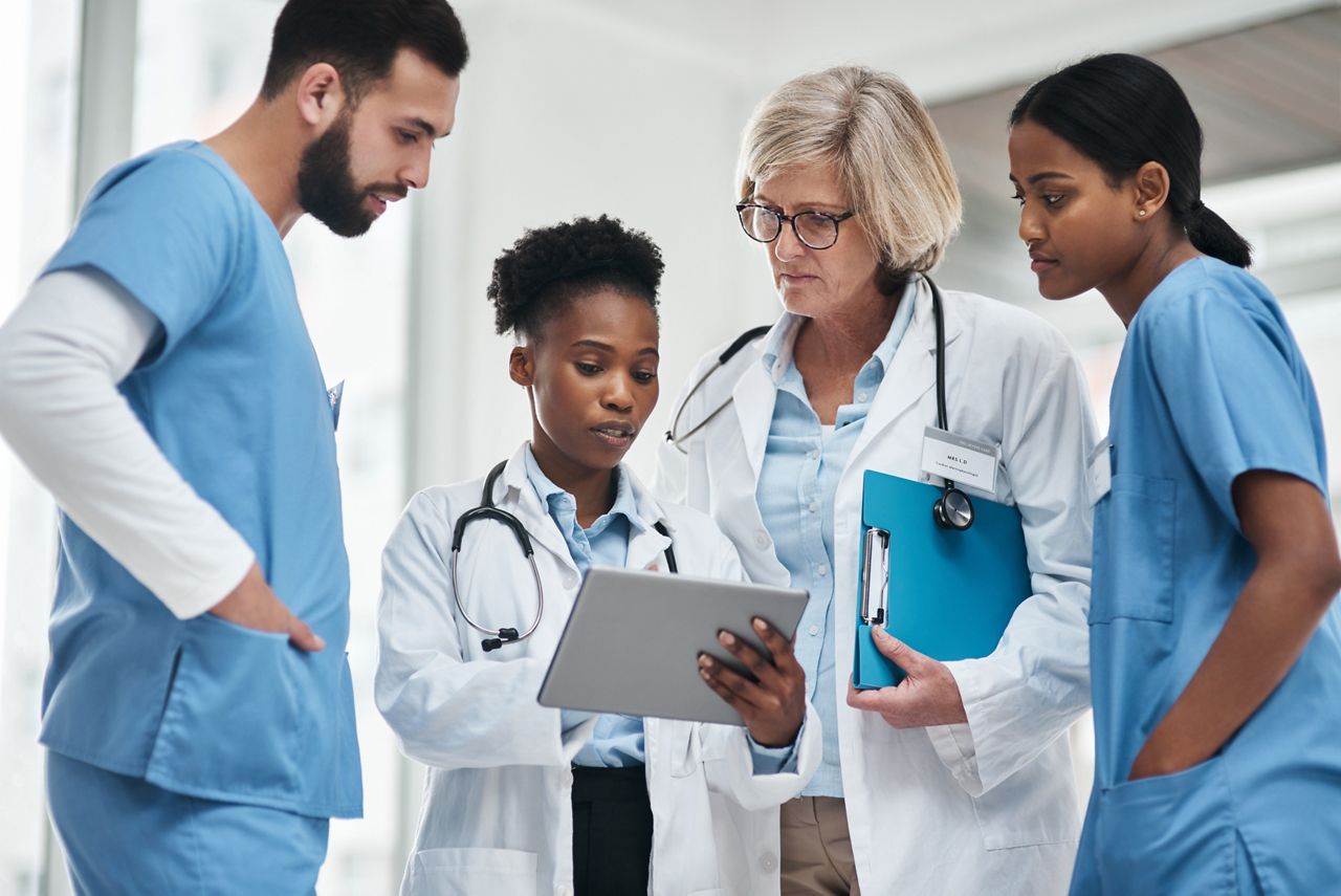Training, meeting and doctor with tablet for online patient report, results review and diagnosis. Healthcare, medical people and team communication in hospital, clinic or health facility schedule.