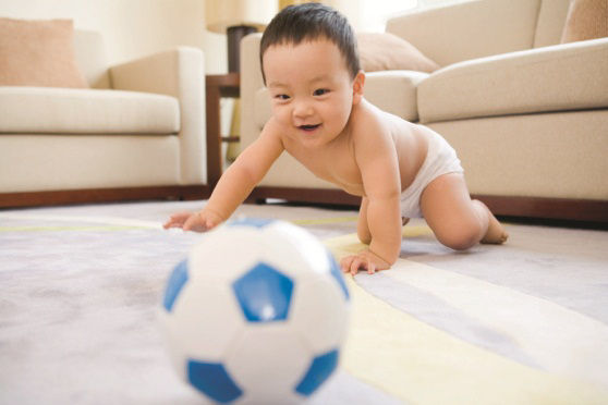 Infant with soccer ball