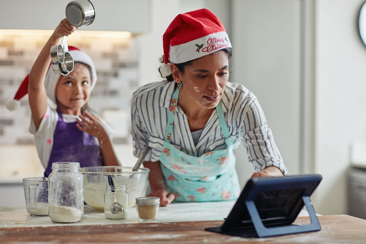 Cropped shot of a mother and daughter spending quality time while baking at home