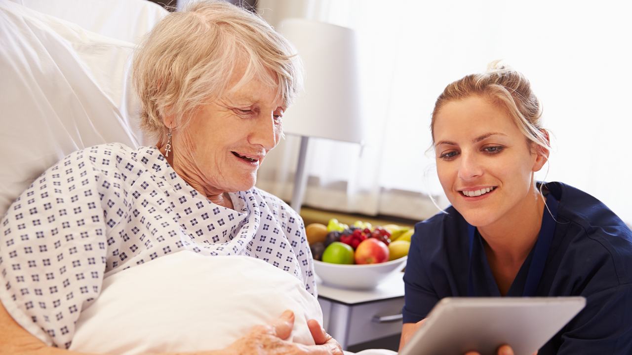 Nurse Talking To Senior Female Patient In Hospital Bed; Shutterstock ID 317585675; Purchase Order: 1400; Job: 600799; Client/Licensee: Nutricia