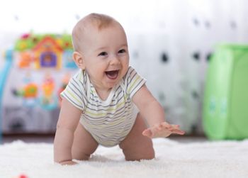 crawling funny baby boy in nursery at home; Shutterstock ID 1025718463; purchase_order: DNC Thumbnails; job: Webinars 3 (50/188); client: ; other: 