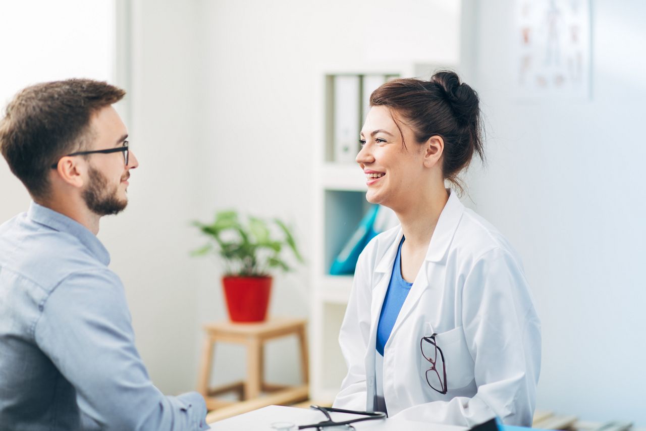 Female Doctor Examining Patient in her Office; Shutterstock ID 1145491847; purchase_order: 25 thumbnail photos ; job: ; client: ; other: 