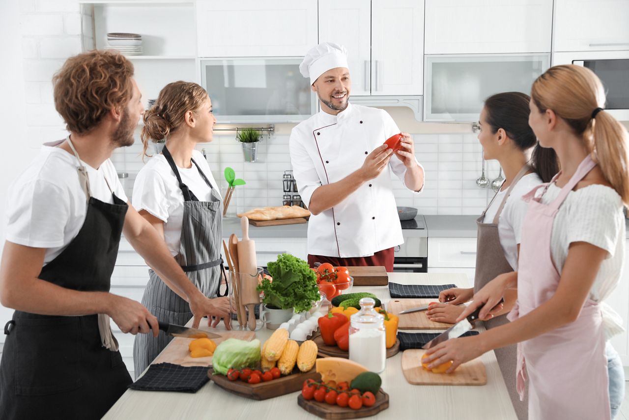 Group of people and male chef at cooking classes; Shutterstock ID 1163912815; purchase_order: DNC Thumbnails; job: Webinars 2 (50/188); client: ; other: 