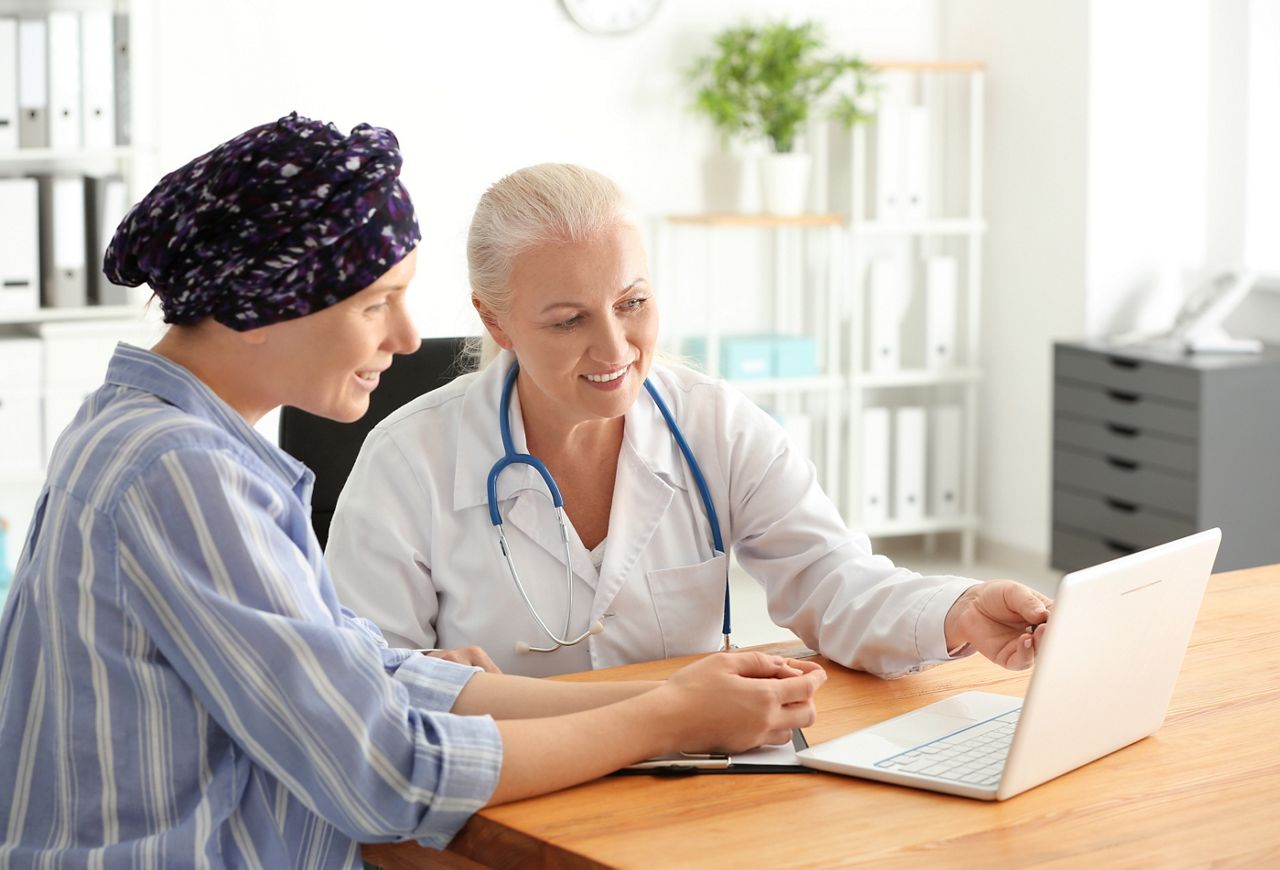 Woman after chemotherapy visiting doctor in hospital; Shutterstock ID 1184899237; purchase_order: DNC Thumbnails; job: Webinars 1 (50/189); client: ; other: 