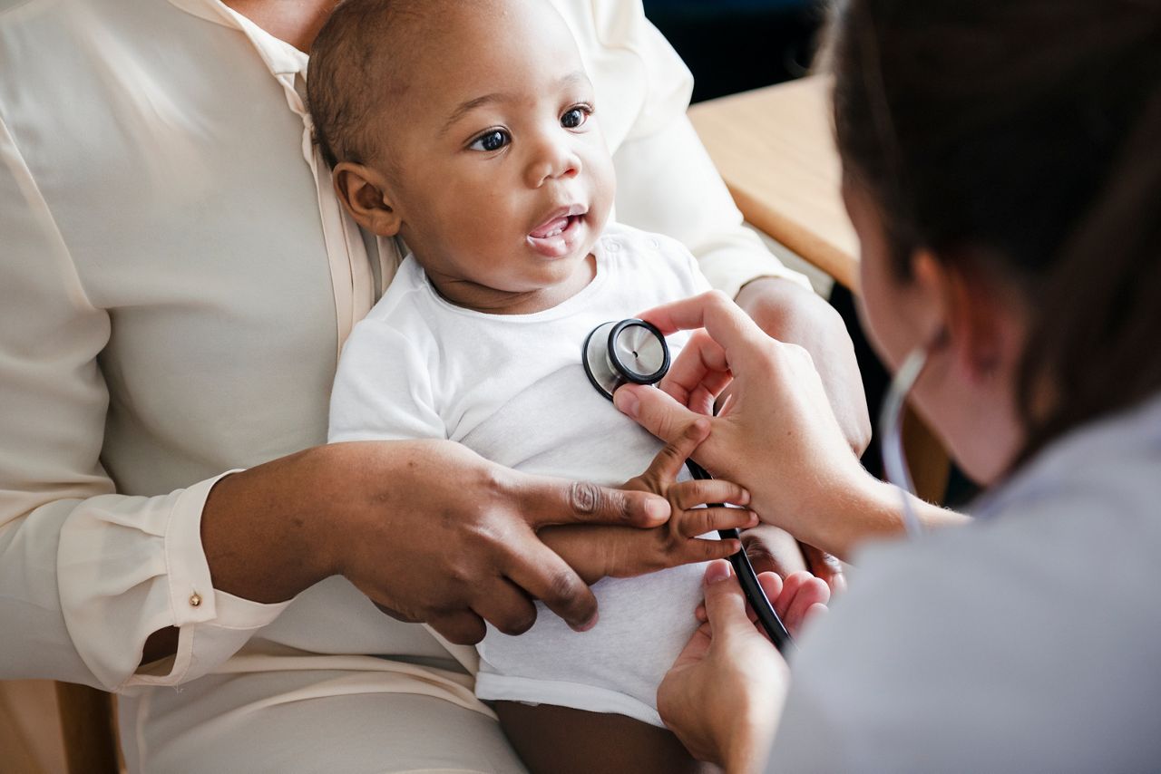 Baby visit to the doctor; Shutterstock ID 1250646838; purchase_order: DNC Thumbnails; job: Webinars 2 (50/188); client: ; other: 