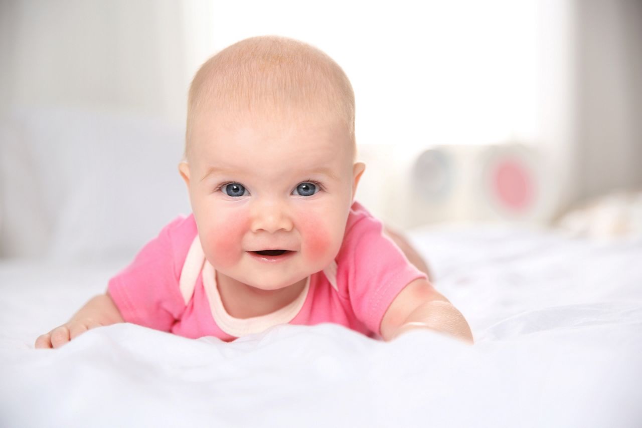 Adorable little baby with allergy lying on bed at home; Shutterstock ID 1312640912; purchase_order: DNC Thumbnails; job: Webinars 2 (50/188); client: ; other: 