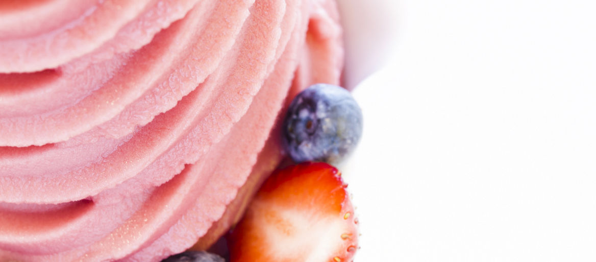 Cup of soft-serve frozen yogurt on white background.; Shutterstock ID 132530069; Project Name: YoCream website; Job: ABM