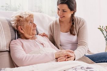 Young daughter supporting sick mother lying in hospital bed; Shutterstock ID 1342049798; purchase_order: DNC Thumbnails; job: Infographics; client: ; other: 