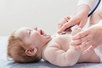 doctor listens to small child with  stethoscope; Shutterstock ID 1356789965; purchase_order: DNC Thumbnails; job: Webinars 4 ; client: ; other: 