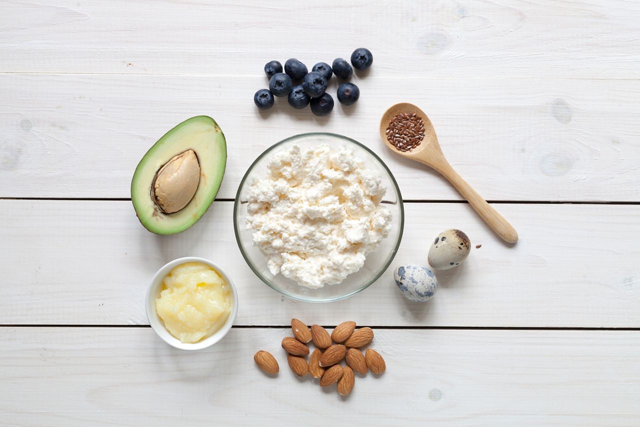 Ketogenic food: eggs, avocado, berries, butter, cream, nuts. Healthy fats.; Shutterstock ID 1403390210; purchase_order: DNC Thumbnails; job: Webinars 1 (50/189); client: ; other: 