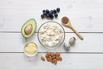 Ketogenic food: eggs, avocado, berries, butter, cream, nuts. Healthy fats.; Shutterstock ID 1403390210; purchase_order: DNC Thumbnails; job: Webinars 1 (50/189); client: ; other: 