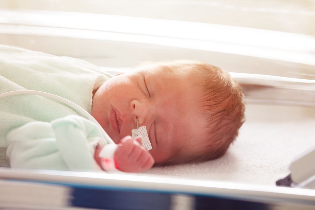 Close-up of a baby in ICU with nose tube feeding; Shutterstock ID 1427922155; purchase_order: DNC thumbnails; job: FG Infograhpics; client: ; other: 