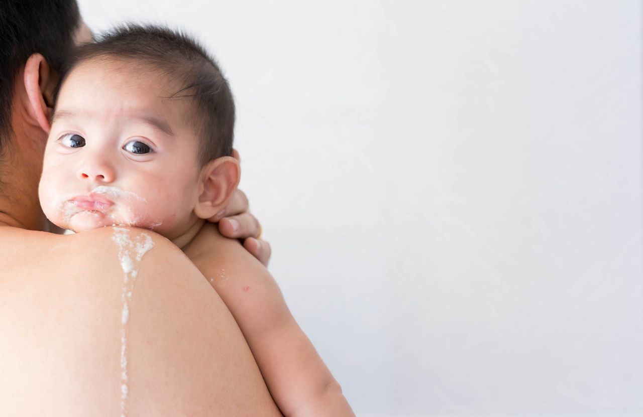 Close up of asian father is carring his baby to belching after breast feeding time, conceptnof parent care to the child and over feeding in baby.; Shutterstock ID 1487040347; purchase_order: -; job: -; client: -; other: -