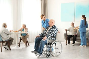 Nurses assisting elderly people at retirement home; Shutterstock ID 1497238637; purchase_order: DNC Thumbnails; job: Publications; client: ; other: Replace Fishwife