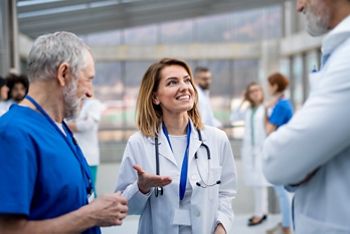 Group of doctors on conference, medical team discussing issues.; Shutterstock ID 1704410551; purchase_order: DNC Thumbnails; job: Webinars 1 (50/189); client: ; other: 