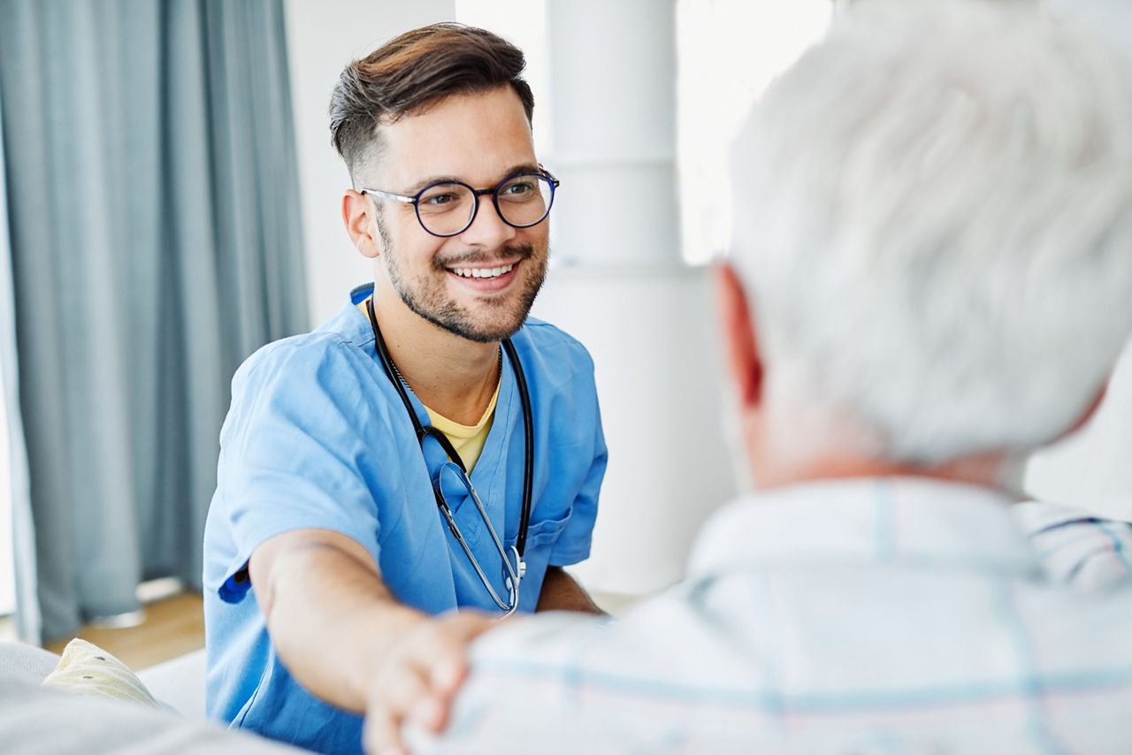 Doctor or male caregiver with senior man holding a cane on sofa at home or nursing home; Shutterstock ID 1783795256; purchase_order: DNC Thumbnails; job: Webinars 3 (50/188); client: ; other: 