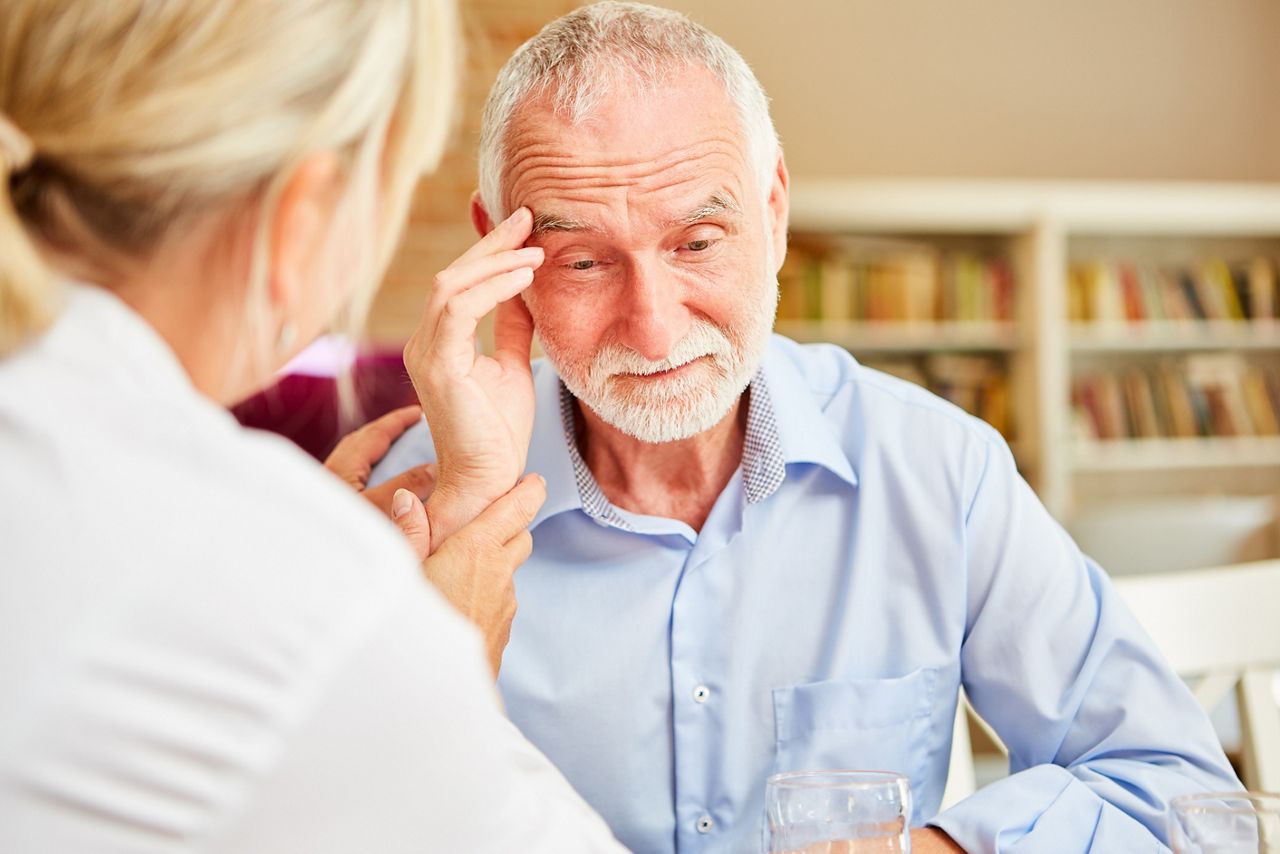 Senior with dementia or Alzheimer's is comforted by caring female doctor; Shutterstock ID 1801707715; purchase_order: DNC Thumbnails; job: Publications; client: ; other: 