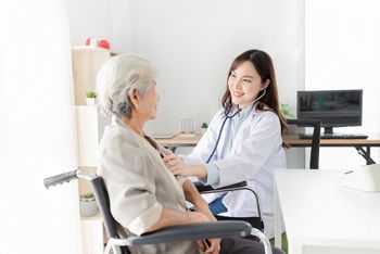 close up doctor, Asian doctor talk with old female patient about disease symptom, doctor use stethoscope listening lung of patient, elderly health check up, happiness hospital; Shutterstock ID 1907197288; purchase_order: SN event thumbnails; job: ; client: ; other: 