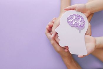 Adult and child hands holding encephalography brain paper cutout,autism, Stroke, Epilepsy and alzheimer awareness, seizure disorder, stroke, ADHD, world mental health day concept; Shutterstock ID 1932094208; purchase_order: DNC Thumbnails; job: Webinars 2 (50/188); client: ; other: 