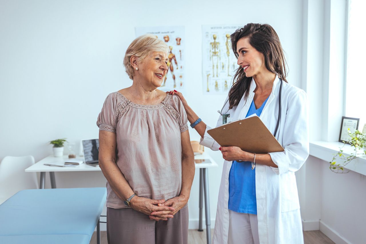 Portrait of female doctor explaining diagnosis to her patient. Female Doctor Meeting With Patient In Exam Room. Cropped shot of a medical practitioner reassuring a patient; Shutterstock ID 2169885985; purchase_order: DNC Thumbnails; job: Documents; client: ; other: 