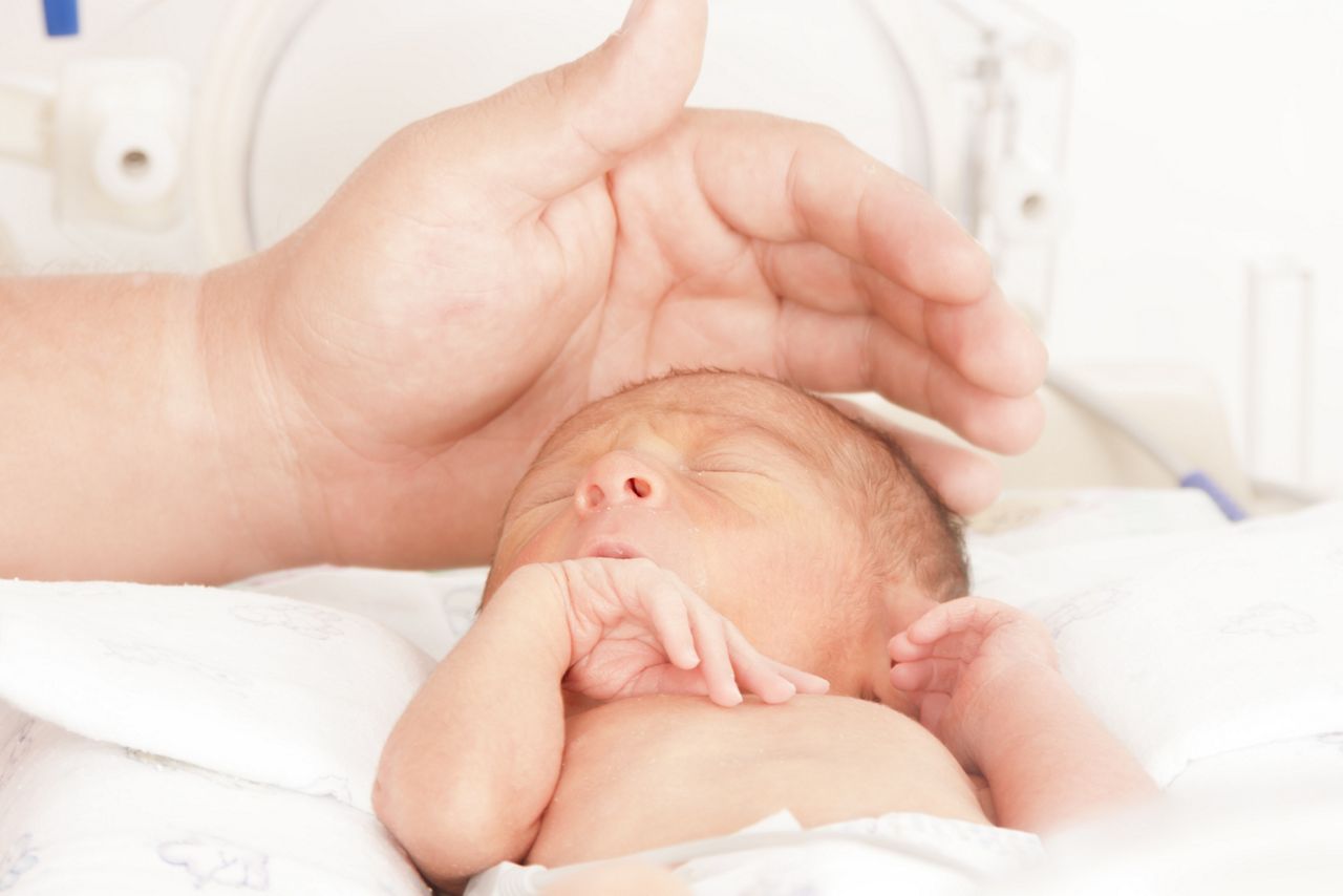 Portrait of newborn baby sleeping inside incubator; Shutterstock ID 232146982; purchase_order: DNC Thumbnails; job: Publications; client: ; other: 