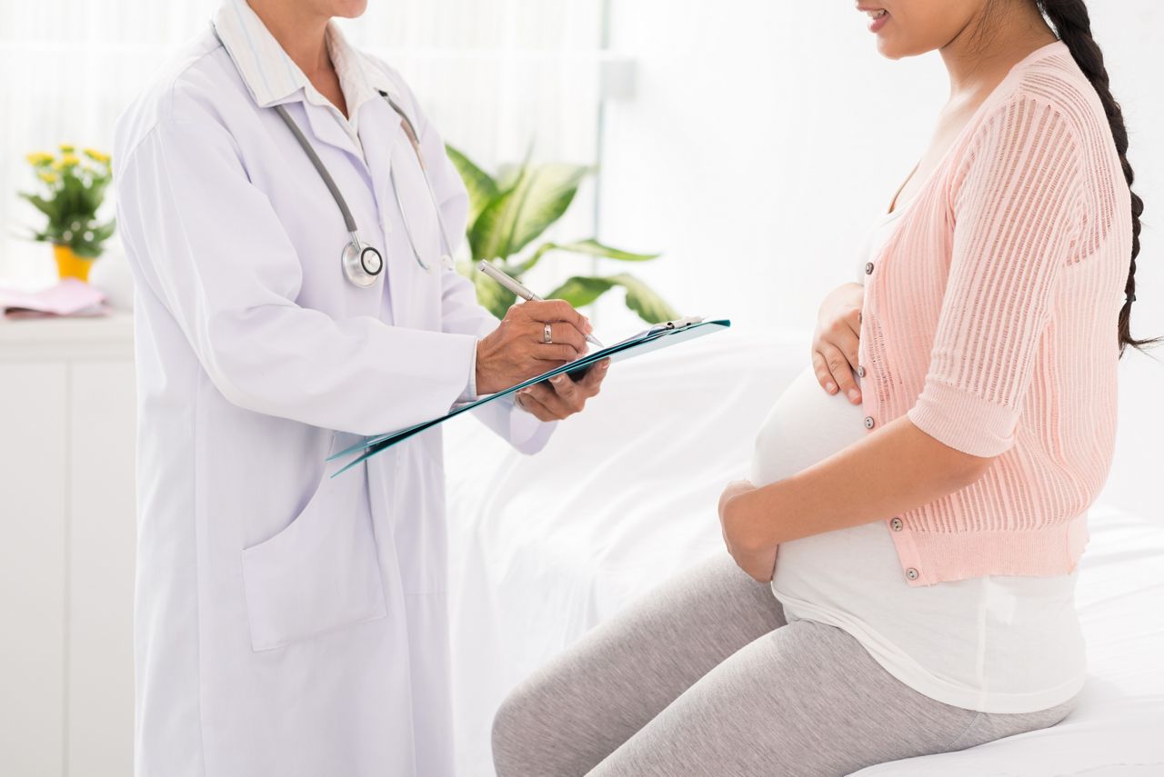 Cropped image of pregnant woman visiting doctor; Shutterstock ID 249370948; purchase_order: DNC Thumbnails; job: Courses; client: ; other: Replace Fishwife