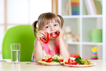 child eating healthy food in kindergarten or at home; Shutterstock ID 307693352; purchase_order: 25 thumbnail photos ; job: ; client: ; other: 