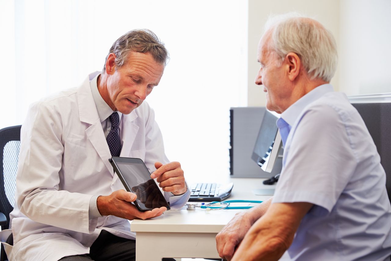 Senior Patient Having Consultation With Doctor In Office; Shutterstock ID 317554598; purchase_order: DNC Thumbnails; job: Publications; client: ; other: 