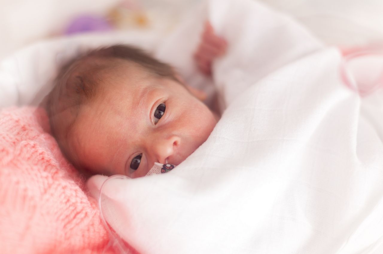 Premature newborn  baby girl in the hospital incubator after c-section in 33 week; Shutterstock ID 396467266; purchase_order: DNC Thumbnails; job: Publications; client: ; other: Replace Fishwife