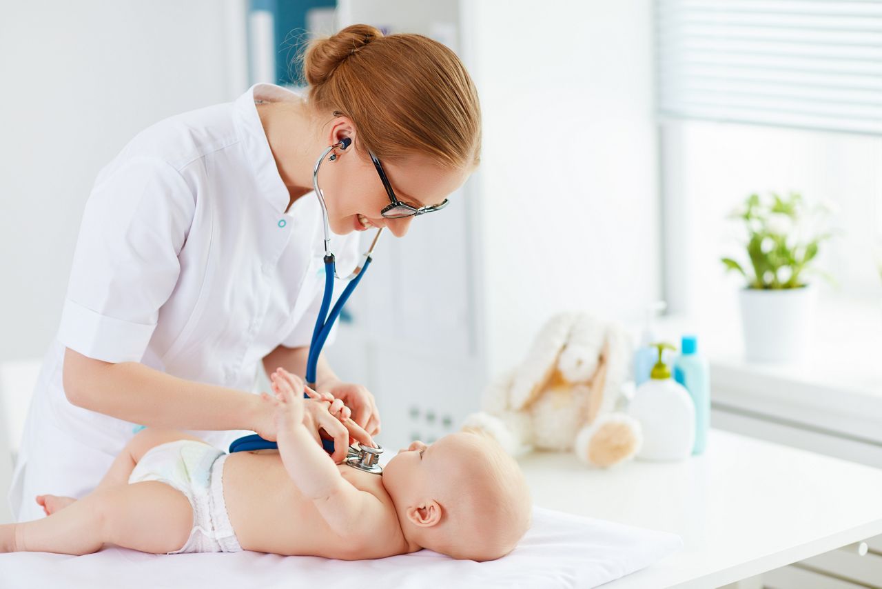 Doctor pediatrician and baby patient in clinic; Shutterstock ID 409317970; purchase_order: DNC Thumbnails; job: Webinars 3 (50/188); client: ; other: 