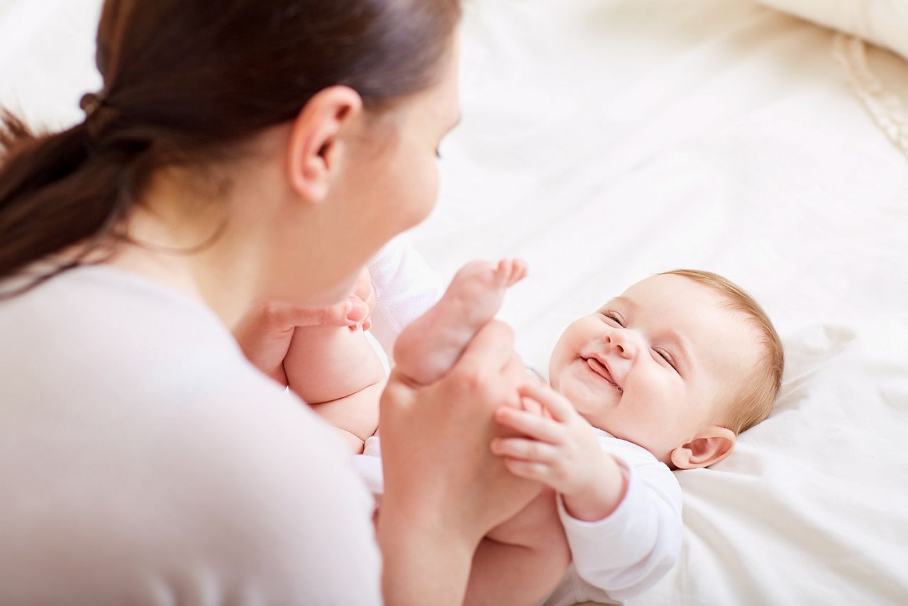 Mother and baby playing and laughing. A happy family; Shutterstock ID 413369704; purchase_order: DNC Thumbnails; job: Webinars 1 (50/189); client: ; other: 