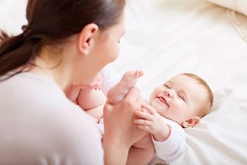 Mother and baby playing and laughing. A happy family; Shutterstock ID 413369704; purchase_order: DNC Thumbnails; job: Webinars 1 (50/189); client: ; other: 