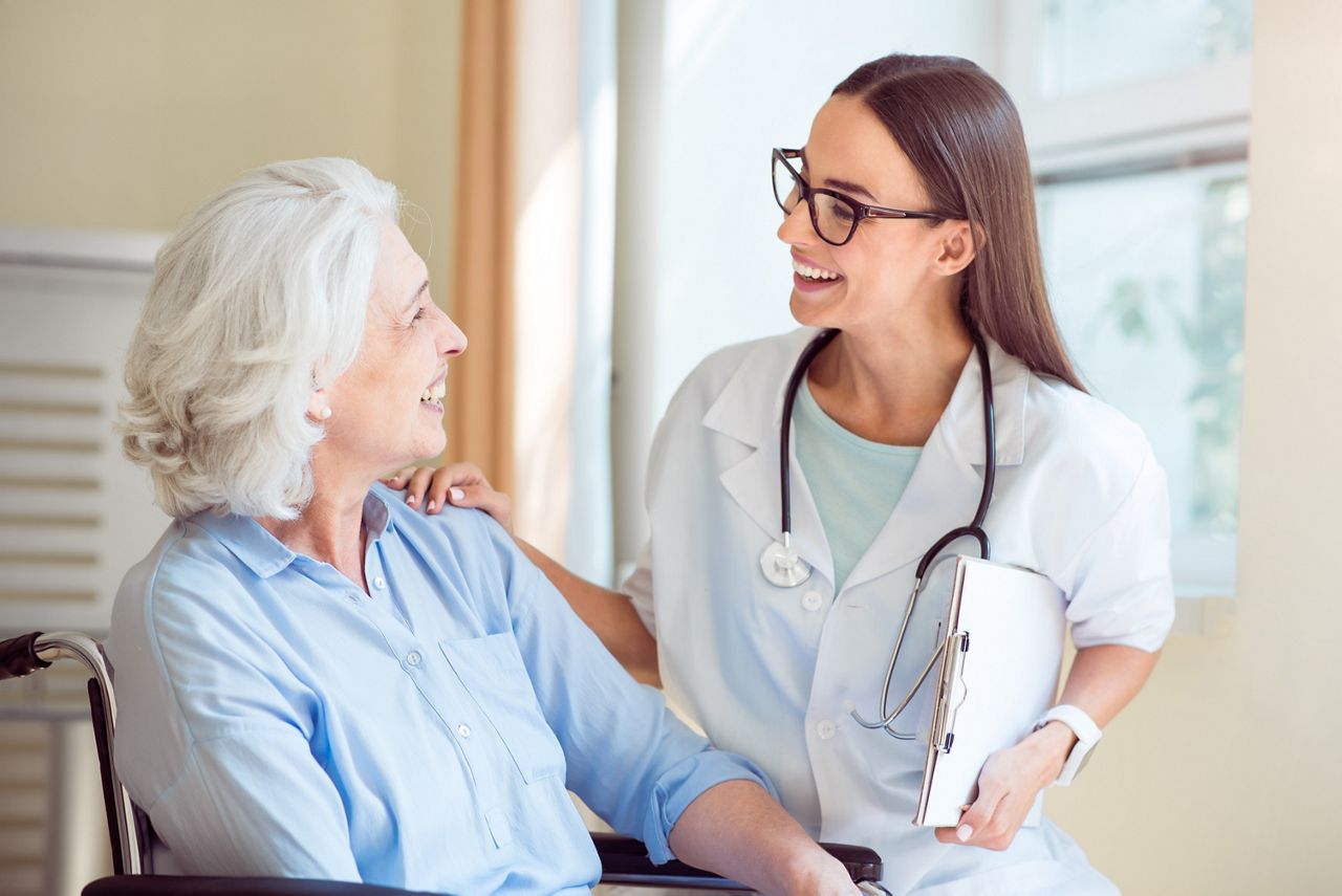 Nice nurse with senior patient; Shutterstock ID 470963747; purchase_order: DNC Thumbnails; job: Collections; client: ; other: 