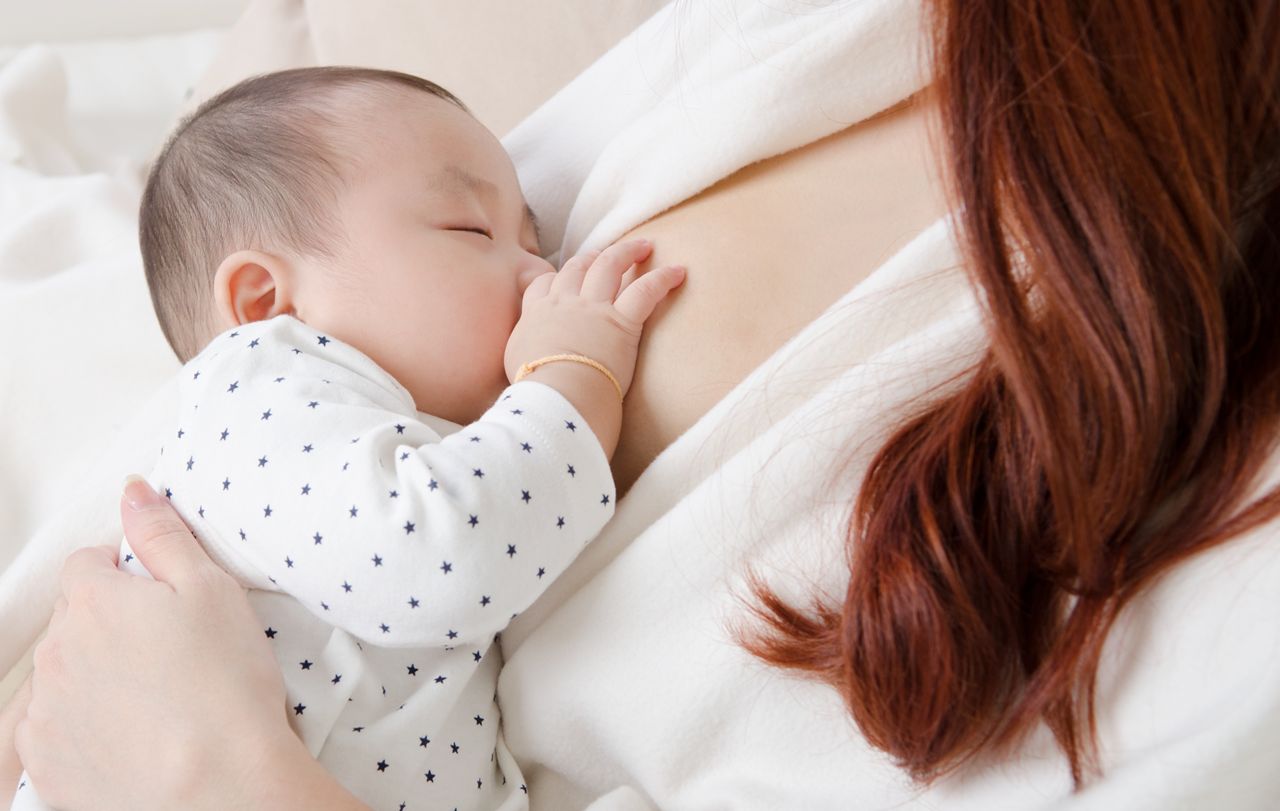 Six months old asian baby drinking breastmilk; Shutterstock ID 522973660; purchase_order: DNC Thumbnails; job: Webinars 1 (50/189); client: ; other: 