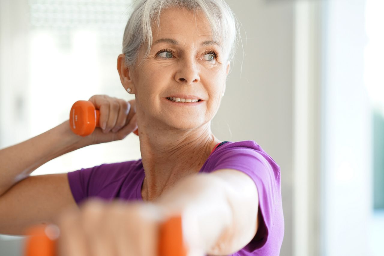 Portrait of senior woman lifting dumbbells; Shutterstock ID 554231740; purchase_order: DNC Thumbnails; job: Videos; client: ; other: 