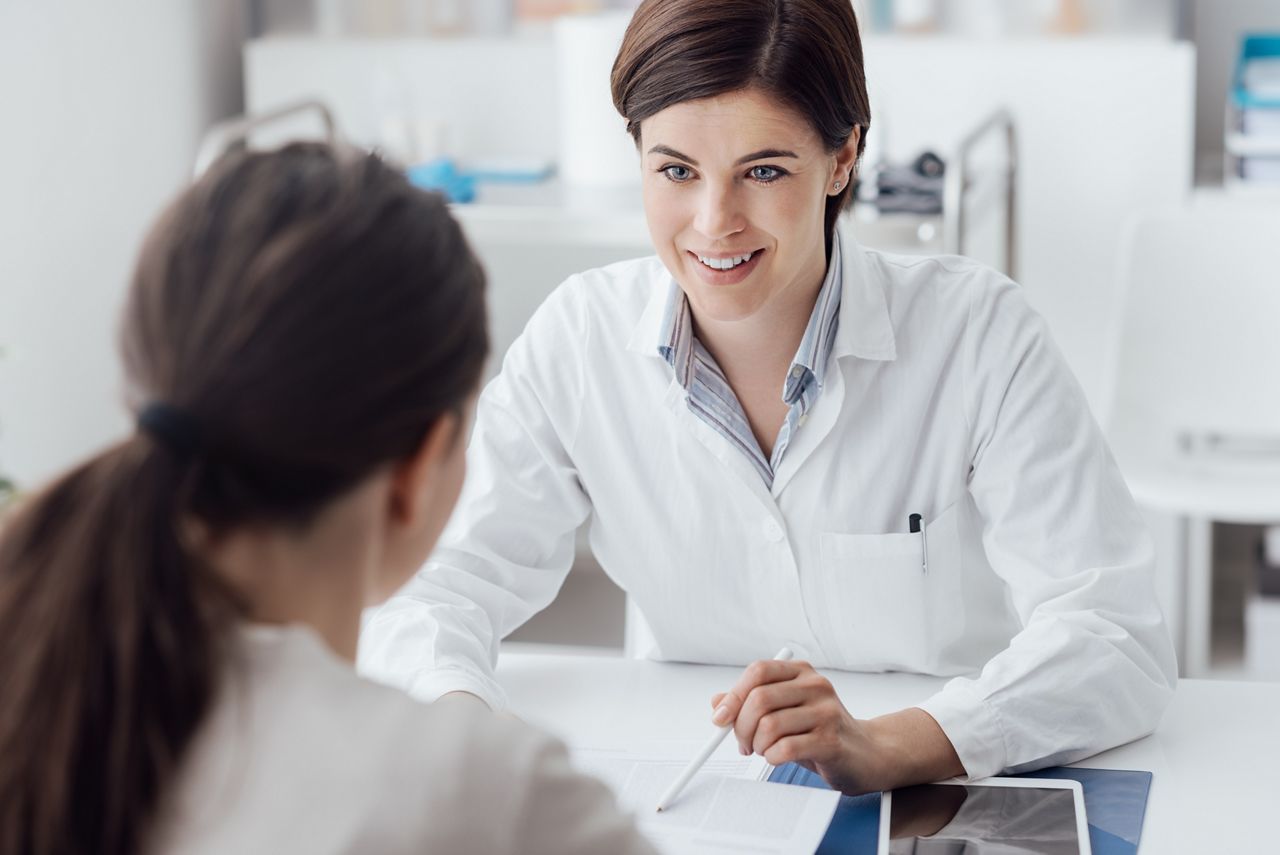 Female doctor giving a consultation to a patient and explaining medical informations and diagnosis; Shutterstock ID 580163959; purchase_order: DNC Thumbnails; job: Webinars 2 (50/188); client: ; other: 