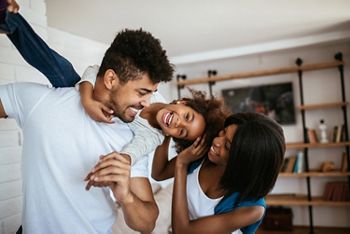 Happy african american family having fun at home.; Shutterstock ID 607570526; purchase_order: DNC Thumbnails; job: Webinars 1 (50/189); client: ; other: 