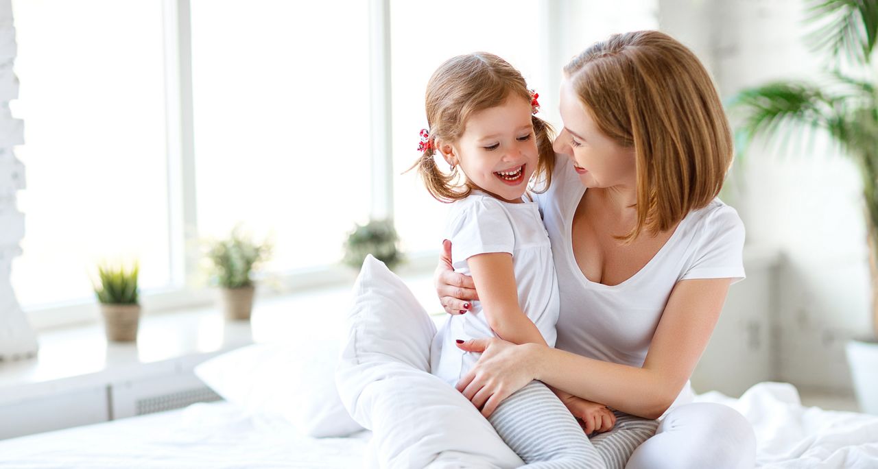Happy family mother and child daughter play and laugh in bed
; Shutterstock ID 629490176; purchase_order: DNC Thumbnails; job: Webinars 1 (50/189); client: ; other: 