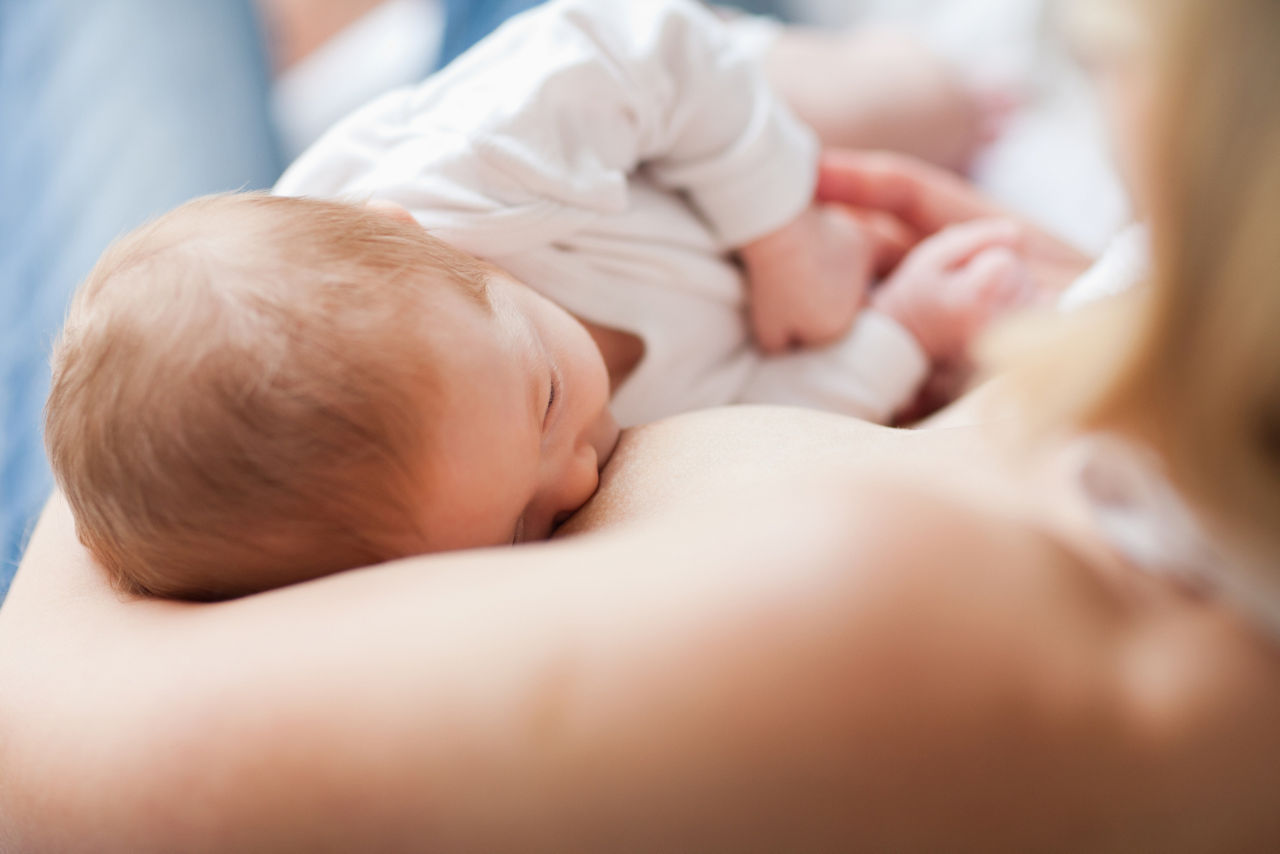 Mother breastfeeding a baby